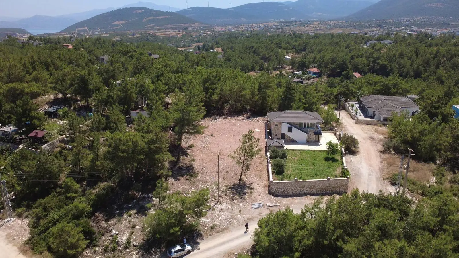 Seyrantepe building plot — aerial view of the plot in pine forest