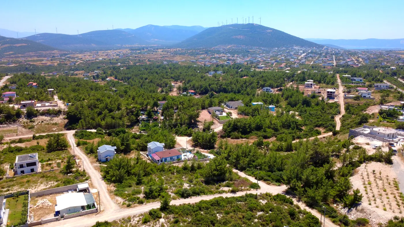 Green hills and scattered houses at the edge of Yeşiltepe, Didim